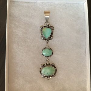 Genuine Native American turquoise pendant. Handmade by Eli Skeets.